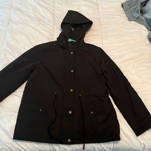 Medium, black, Forever 21 rain jacket with hood, draw strings, and pockets.